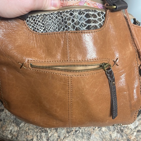 The Sak leather purse. 100% leather. NWOT.